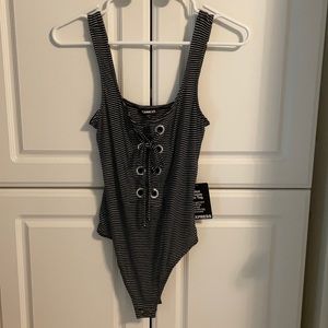 Black and white stripe lace up express bodysuit